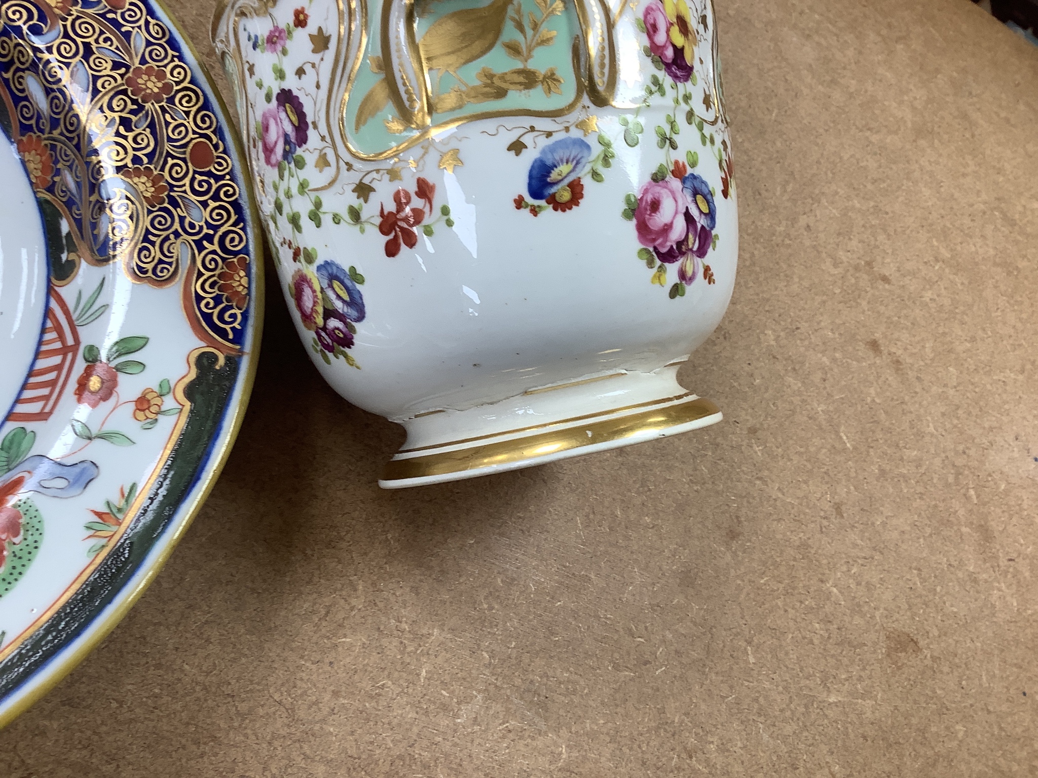 Four 19th century Coalport plates, a Coalport dish, a Minton plate, a Coalport inkstand in Chelsea style and a Derby cache pot, ink stand 40cms wide